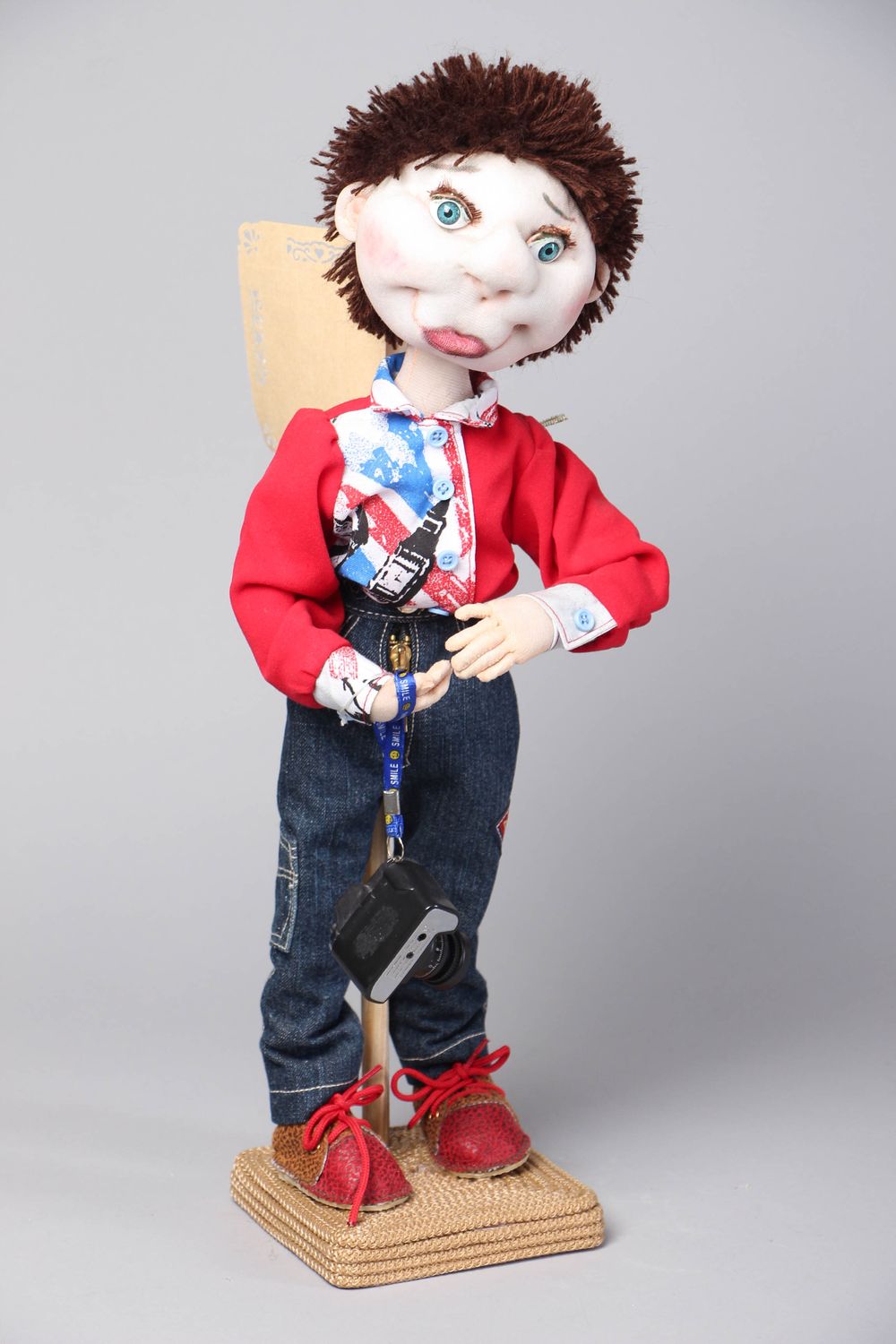 Тканевая кукла на подставке Фотограф фото 1