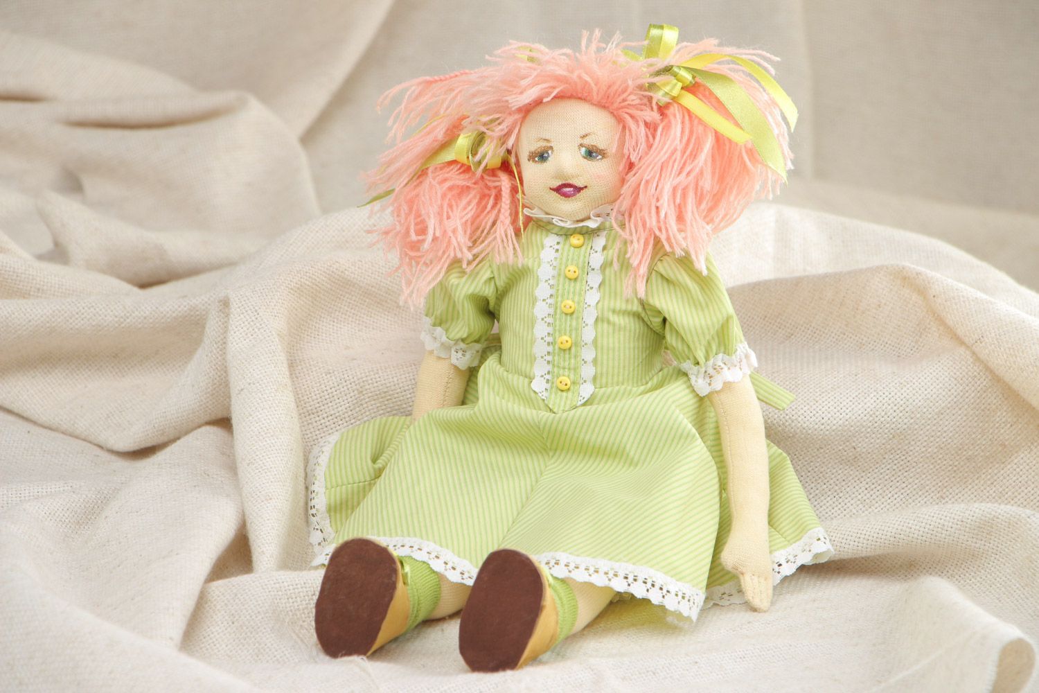 Handmade designer fabric soft doll of average size in green dress photo 1