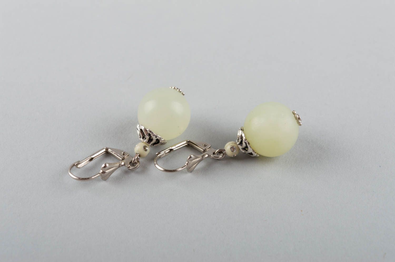 Beautiful handmade elegant brass earrings with natural nephrite stone white photo 5