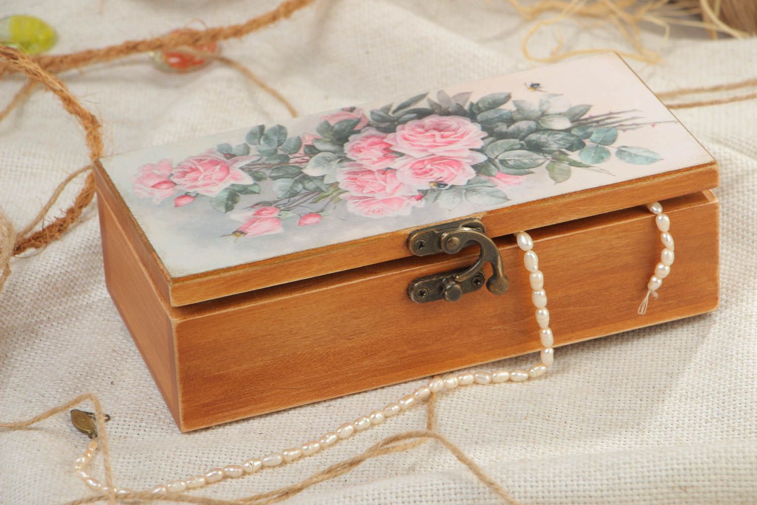 Handmade rectangular wooden jewelry box with floral print on a lid photo 1