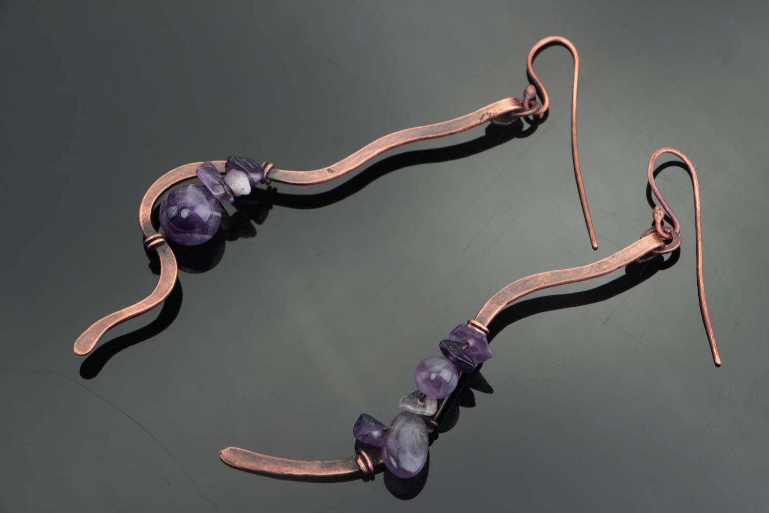 Handmade long curved dangling earrings forged of copper with amethyst beads photo 1