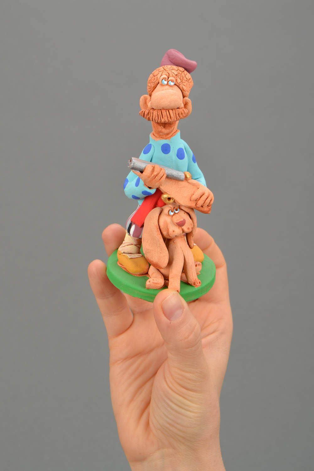 Painted ceramic statuette Hunter with Dog photo 2