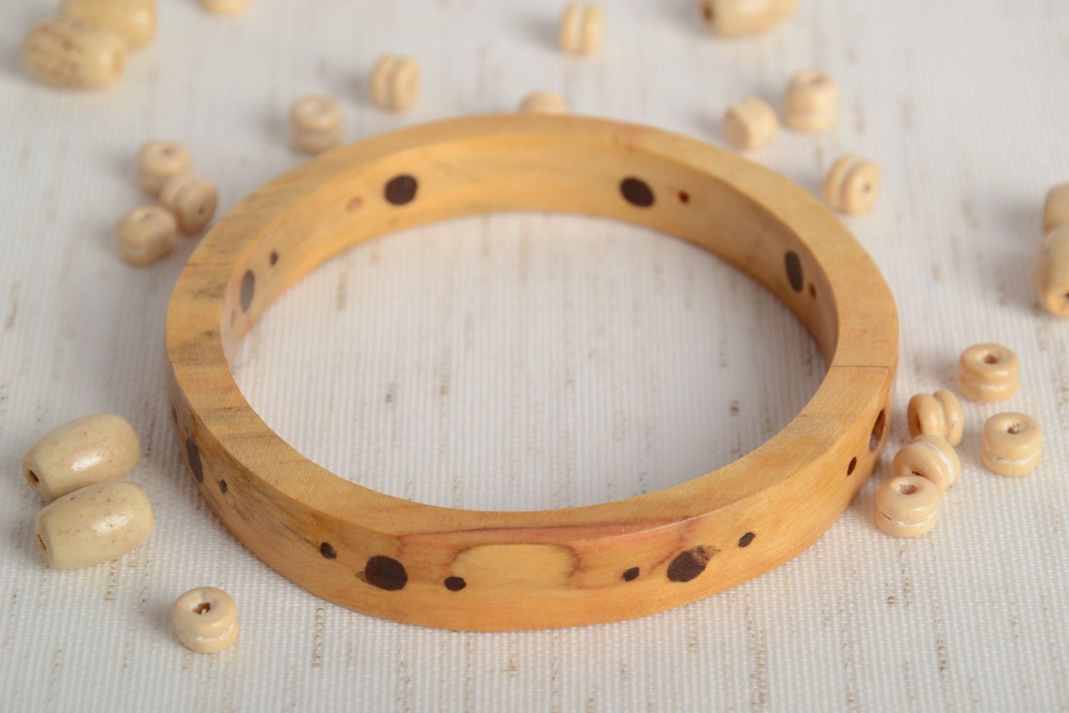 Tender light thin handmade wrist bracelet carved of wood with inlay for women photo 2