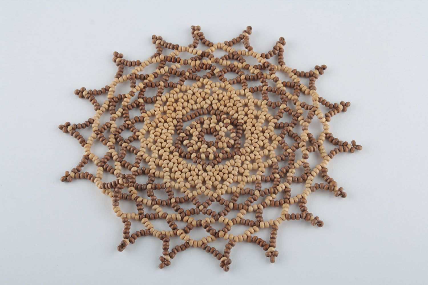 Napkin made of wooden beads photo 4