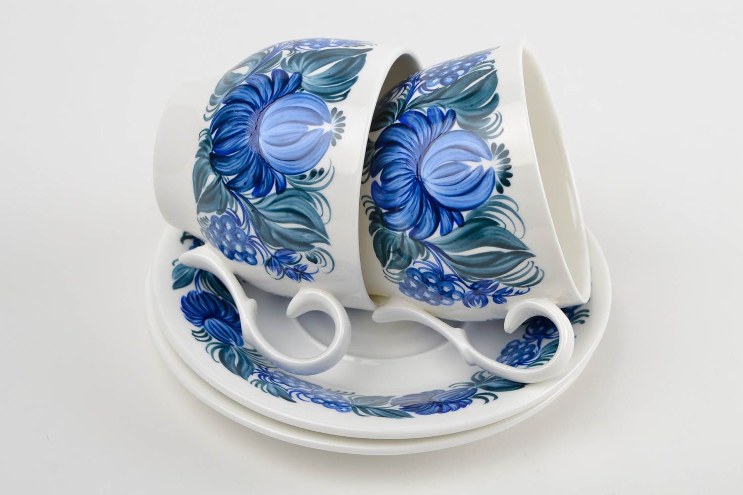 Set of two porcelain white and blue 5 oz tea cups and saucers with floral pattern photo 3