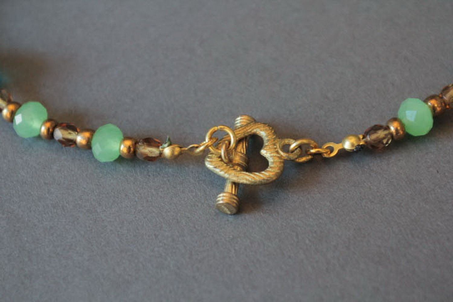 Handmade beaded necklace with decorative stones photo 7