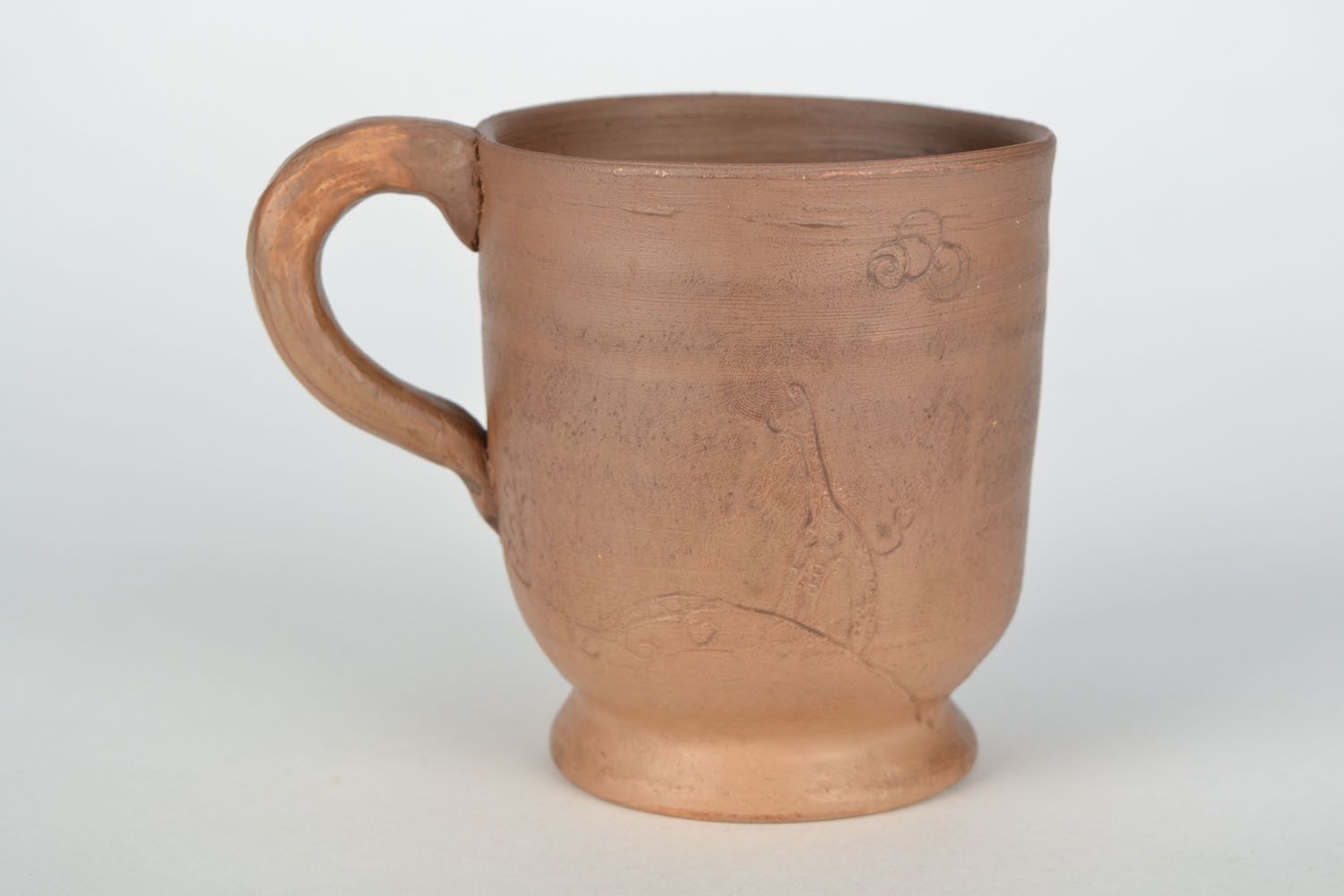 Clay cup for tea in light brown color with Giraffe pattern and handle photo 4