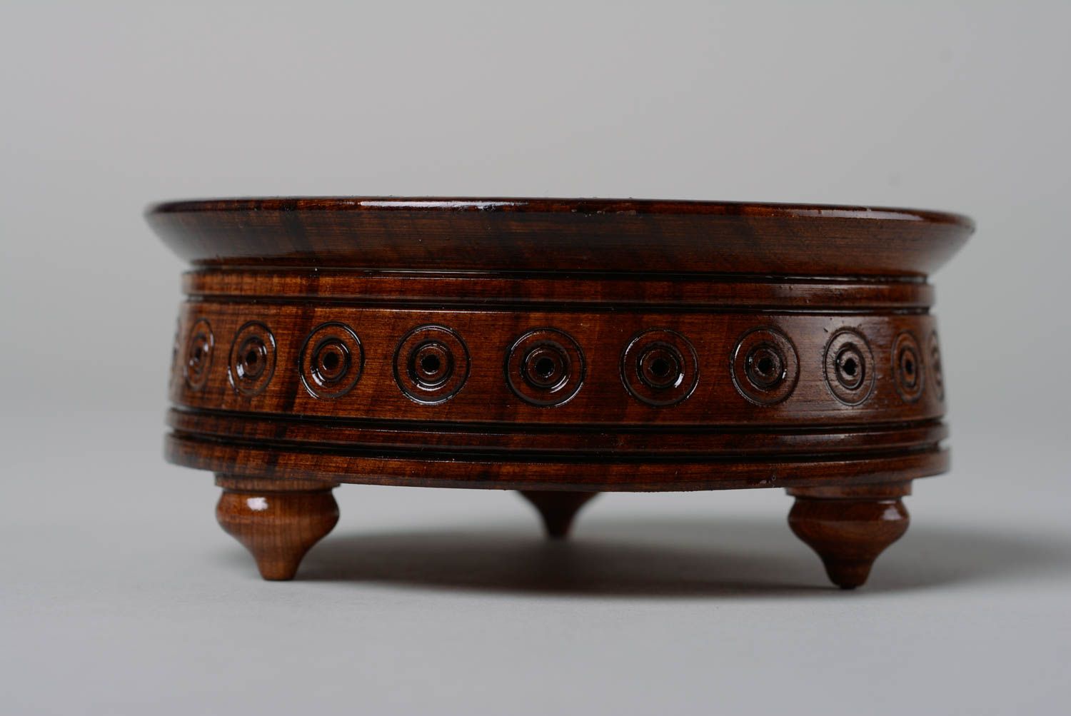 Handmade round varnished wooden candy bowl decorated with carving with legs photo 2