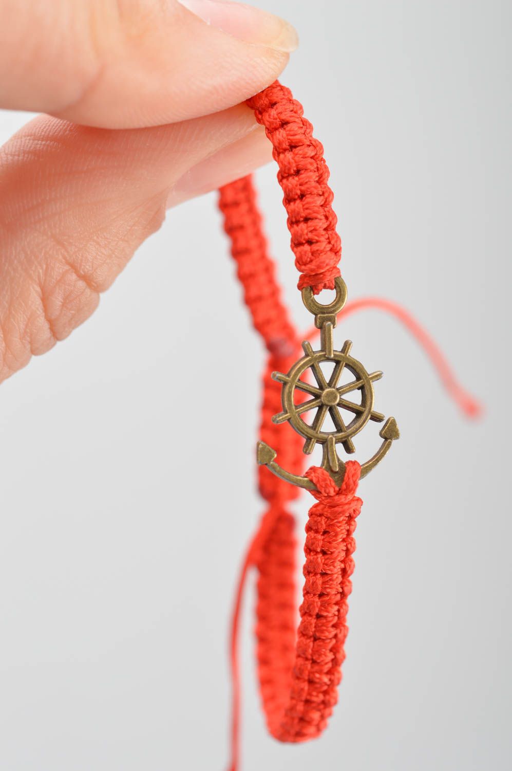 Handmade cute thin woven red bracelet made of silk threads with anchor photo 3