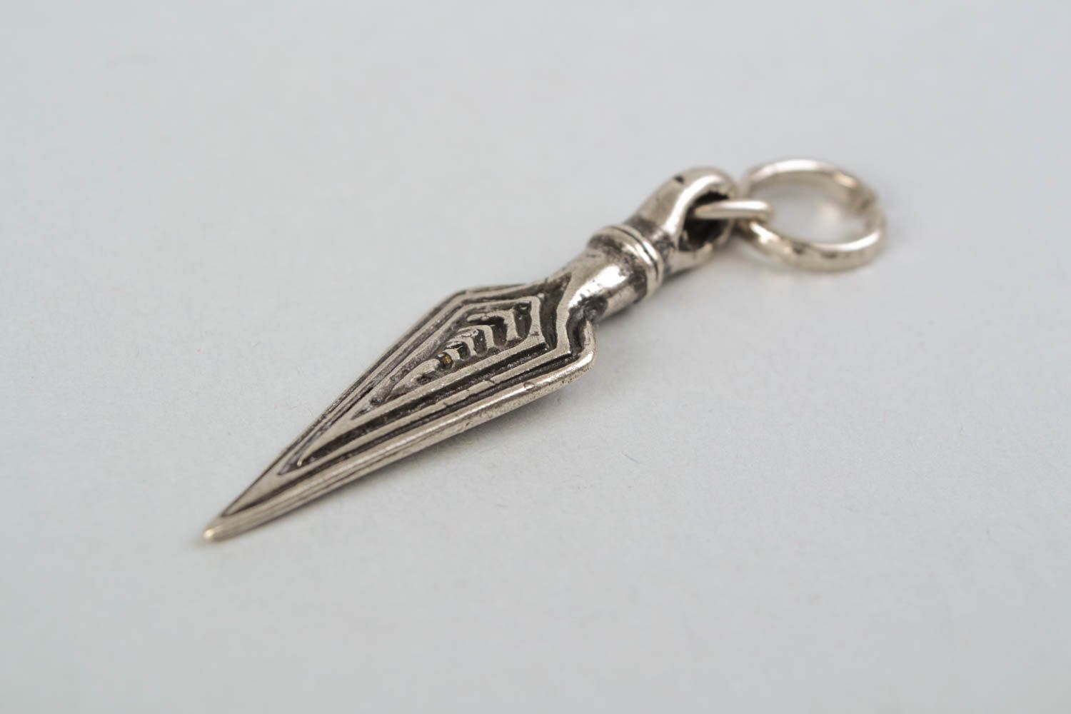 Metal pendant in the shape of dagger photo 4