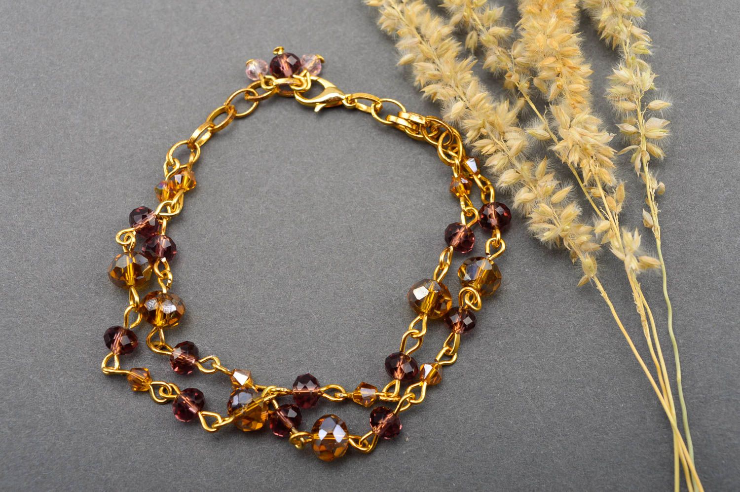 Golden color two layers chain bracelet with golden color beads photo 1