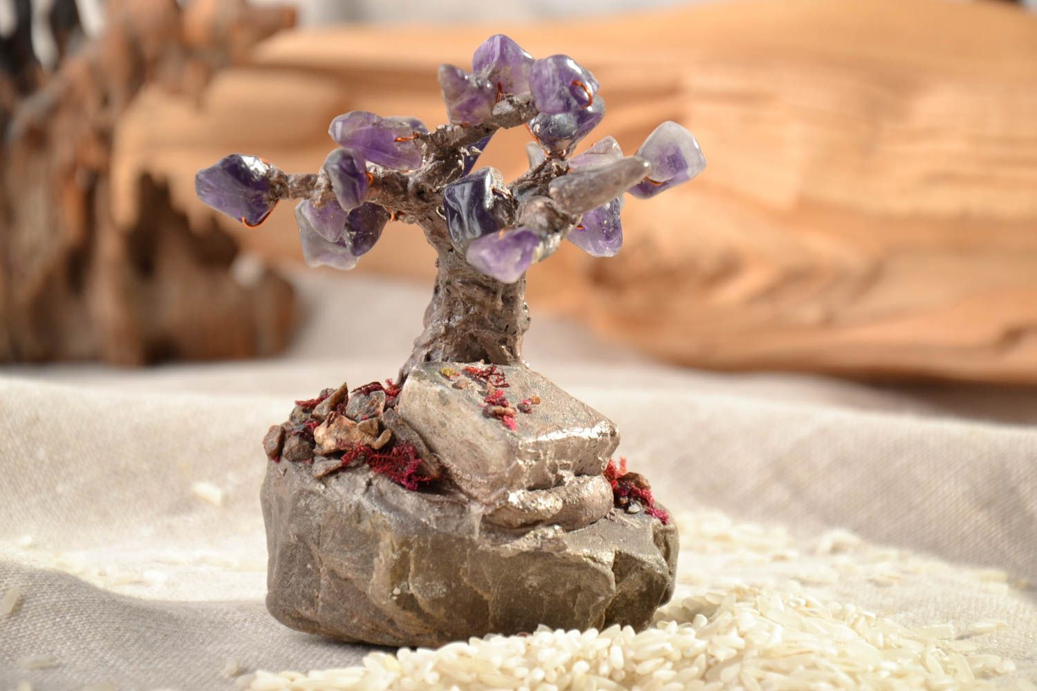 Decorative tree with natural stones photo 1