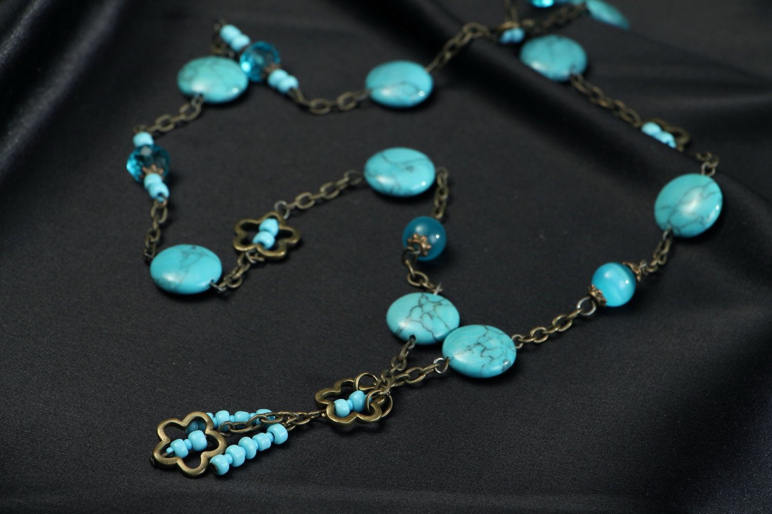 Beaded necklace made of bronze and turquoise photo 2