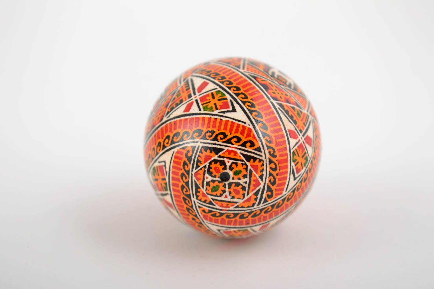 Beautiful handmade painted orange Easter egg with Slavic symbolics photo 5