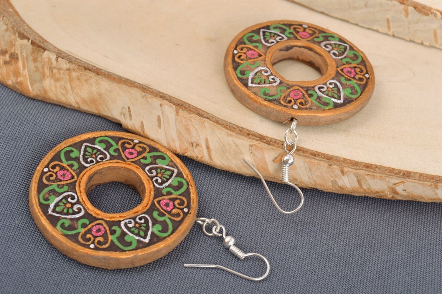 Handmade ring-shaped ceramic dangling earrings painted with festive ornaments photo 1