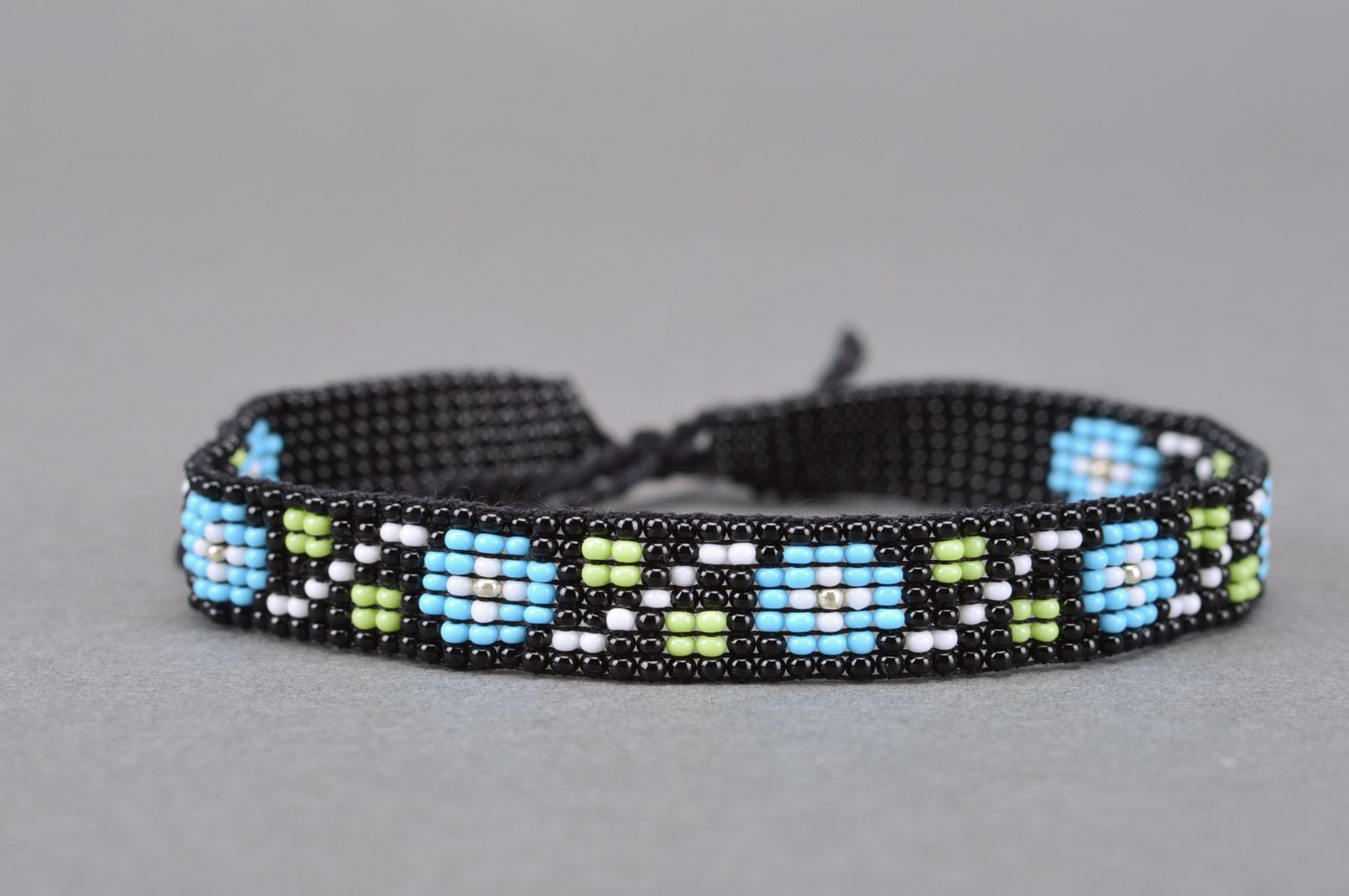 Beautiful designer handmade beaded wrist bracelet of black and blue colors photo 5