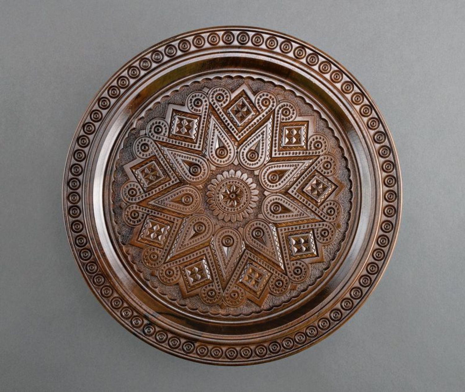 Ethnic wooden plate photo 1