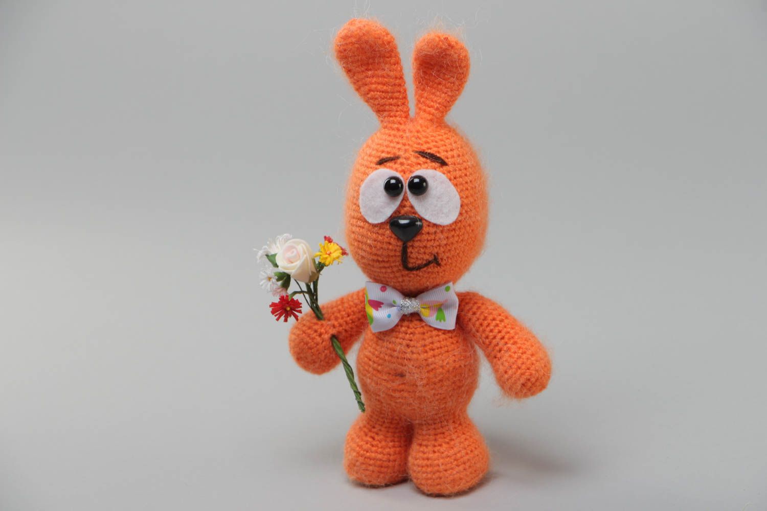 Handmade soft toy crocheted of acrylic threads Orange Rabbit with bouquet photo 2