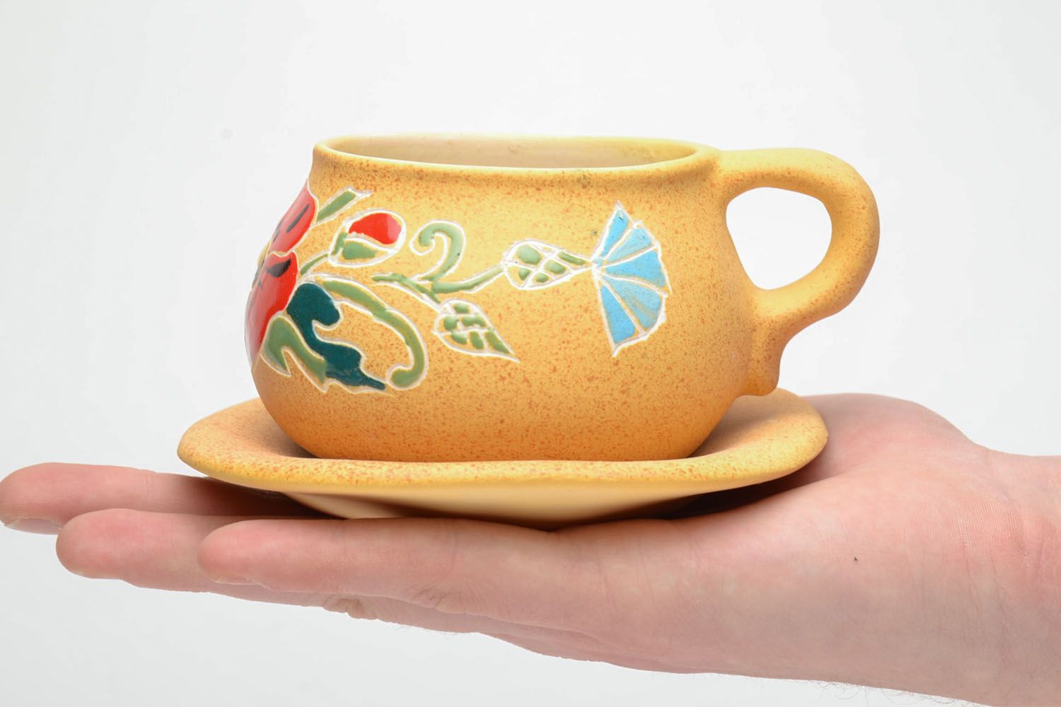 Tasse originale de céramique avec soucoupe photo 5