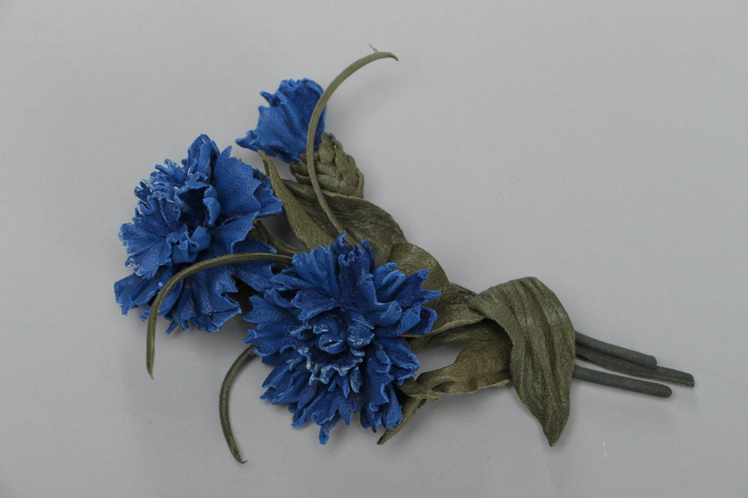 Handmade fashion brooch made of leather in the form of blue cornflowers on a wire base photo 1