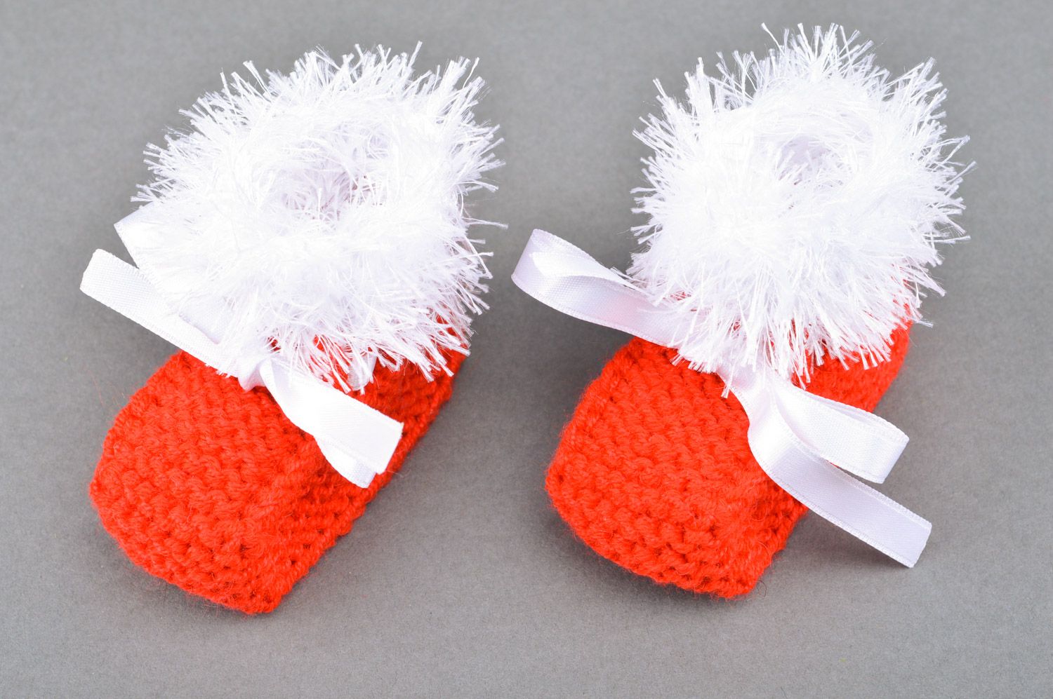 Red handmade knitted half-woolen baby booties with satin bows photo 5