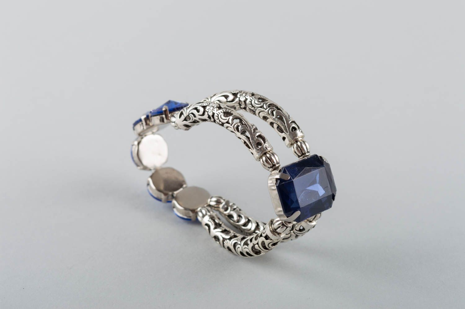 Women's handmade designer metal wrist bracelet with large blue strasses photo 4