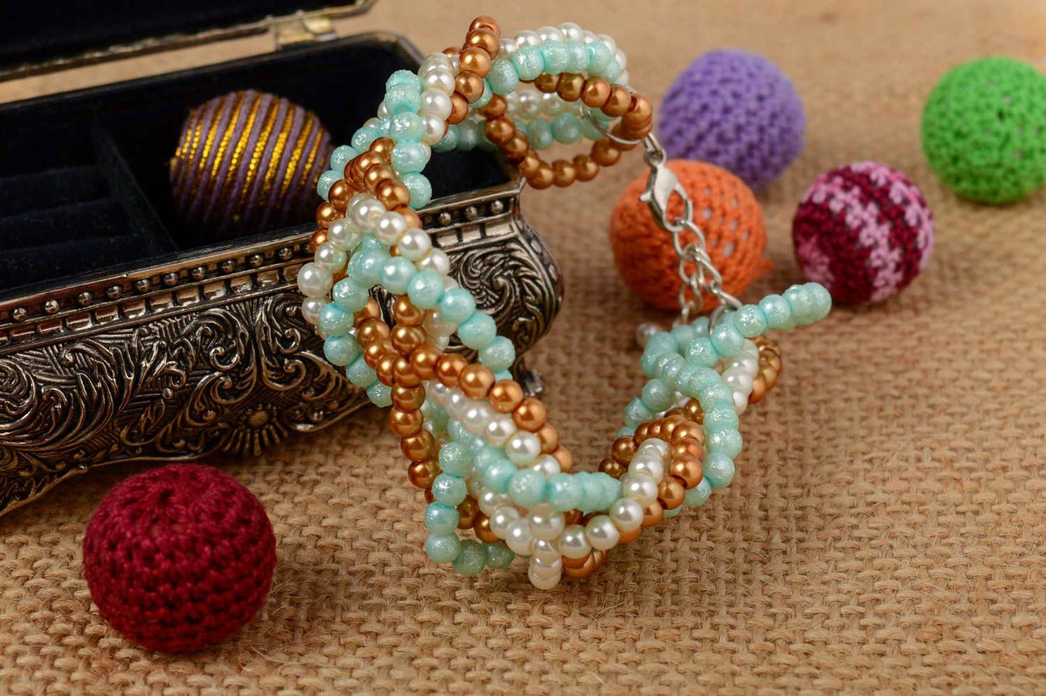 Handmade woven wrist bracelet with colorful light ceramic pearls for women photo 1