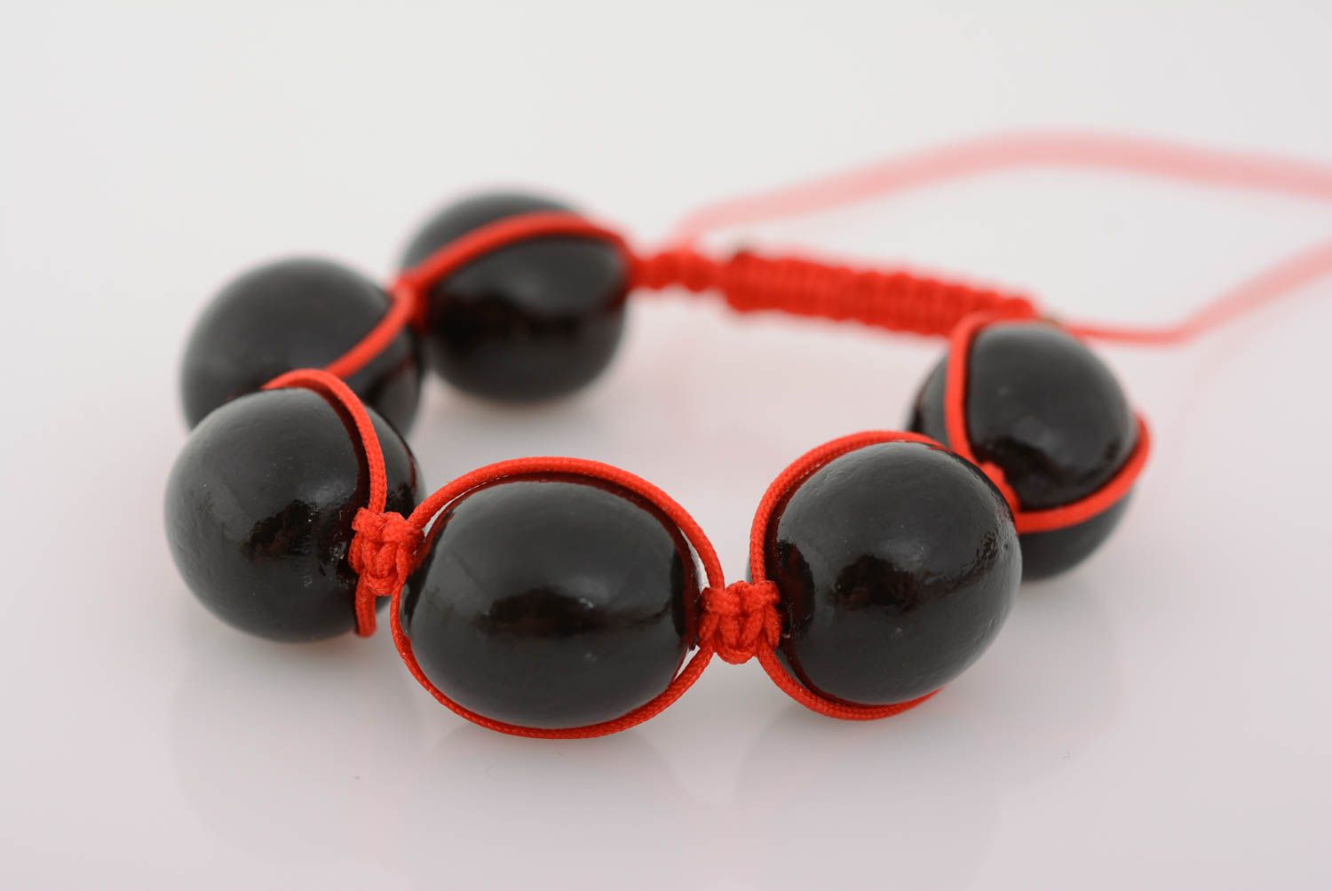 Bracelet with plastic beads on red waxed cord braided handmade accessory photo 1