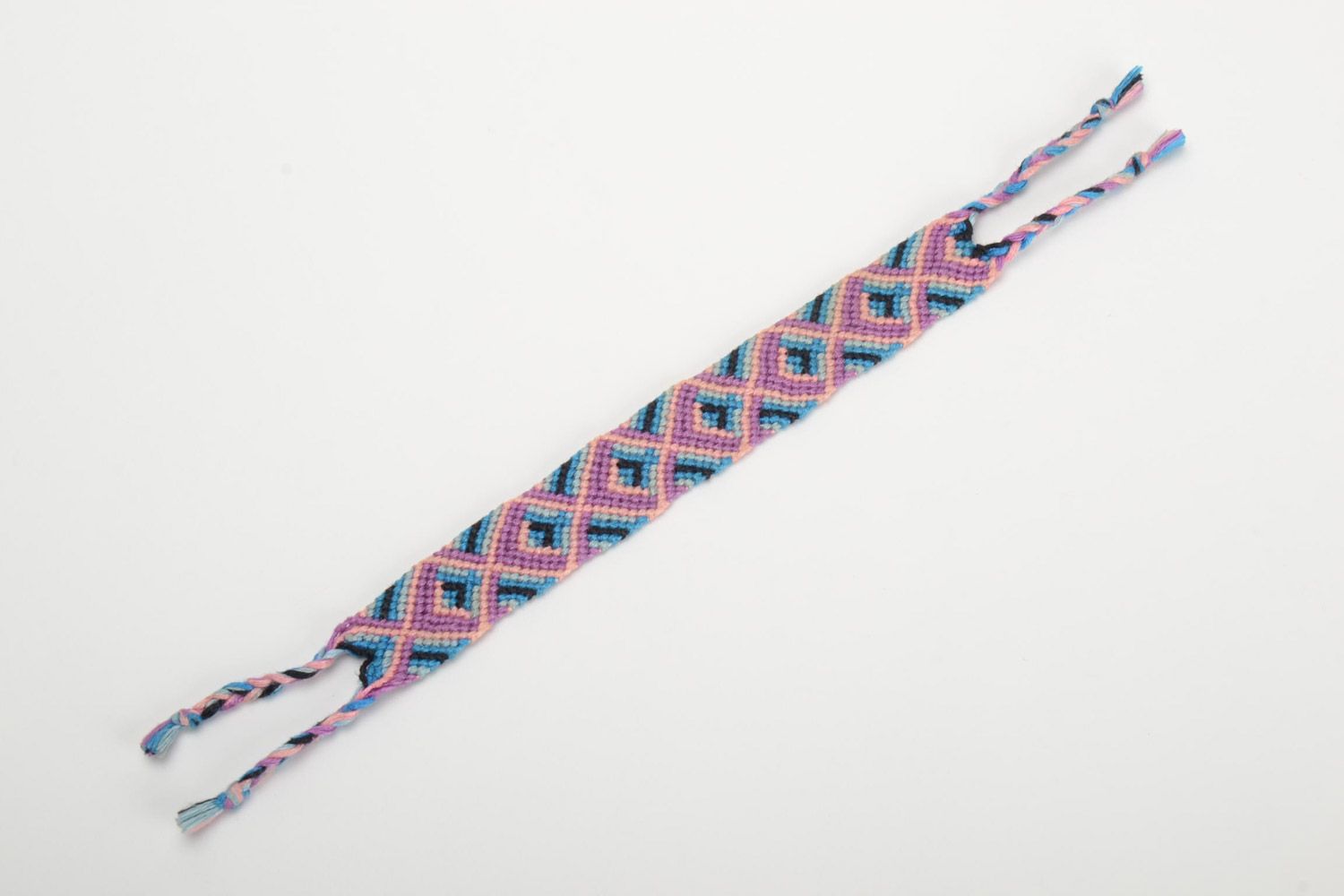 Handmade friendship wrist bracelet woven of threads with bright ornament and ties photo 2