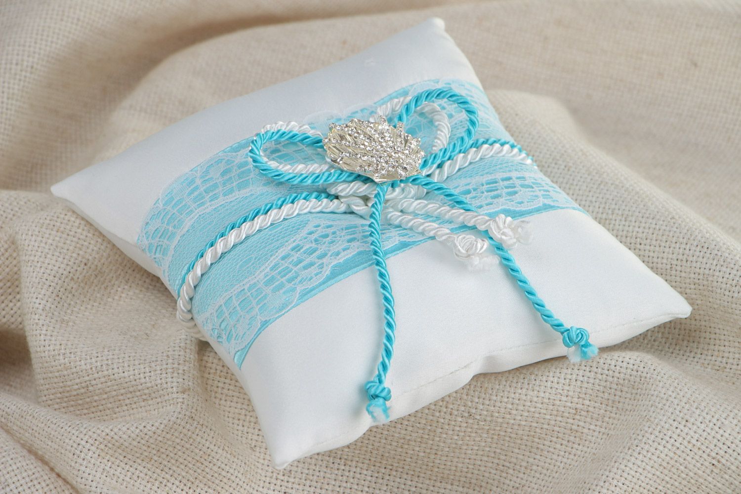 White handmade ring pillow sewn of satin with lace and decorative seashell photo 1