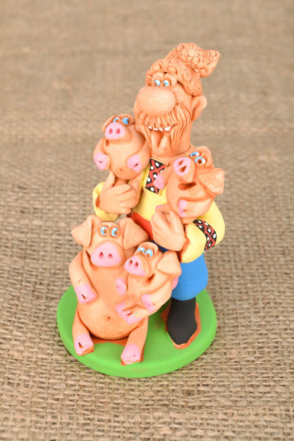 Handmade ceramic statuette The Cossack with Piglets photo 1