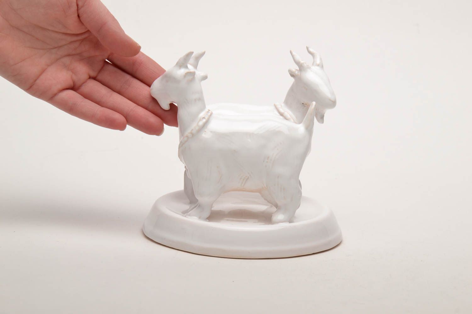 White ceramic statuette Goats photo 2