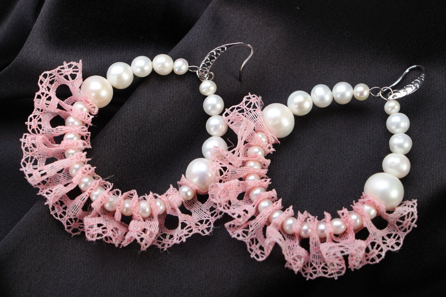Beautiful earrings with pearls photo 1