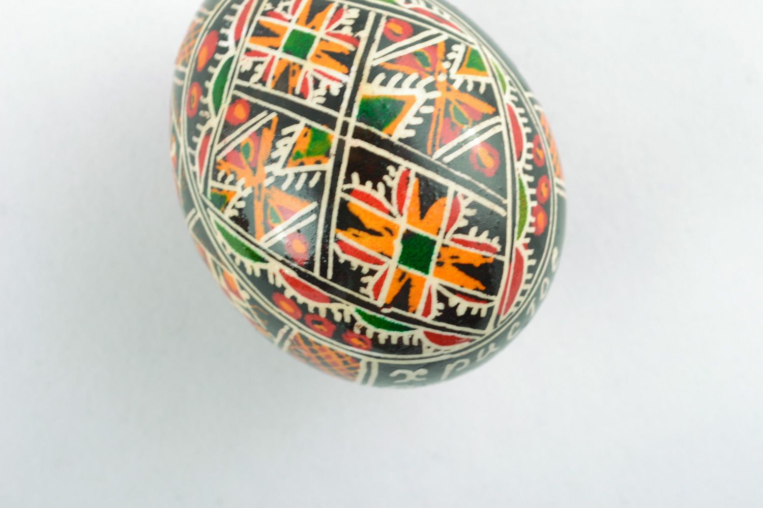 Beautiful handmade chicken egg painted with geometric ornament using wax technique  photo 5