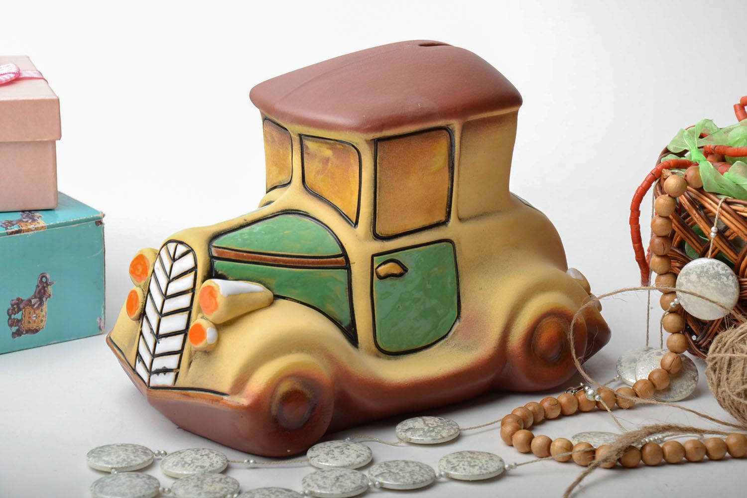 Clay money box in the shape of car photo 1