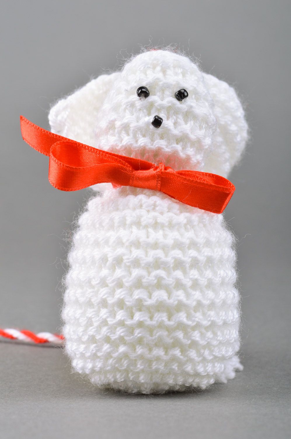 Handmade soft toy knitted of white threads Rabbit with bow for children photo 2