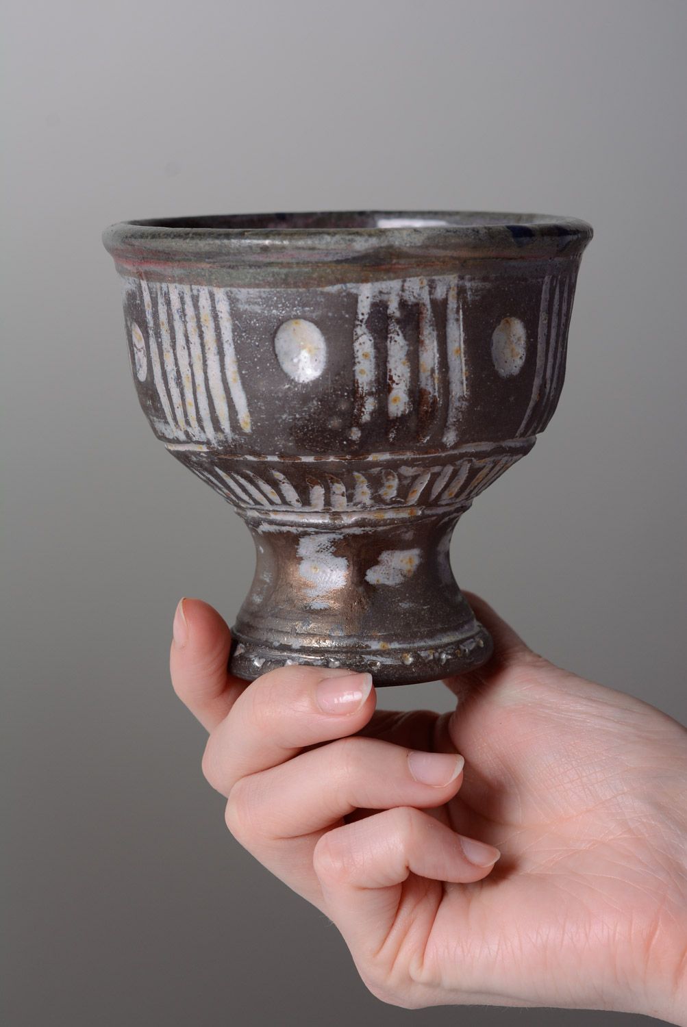 Handmade dark ornamented ceramic goblet created using reduction firing technique photo 4