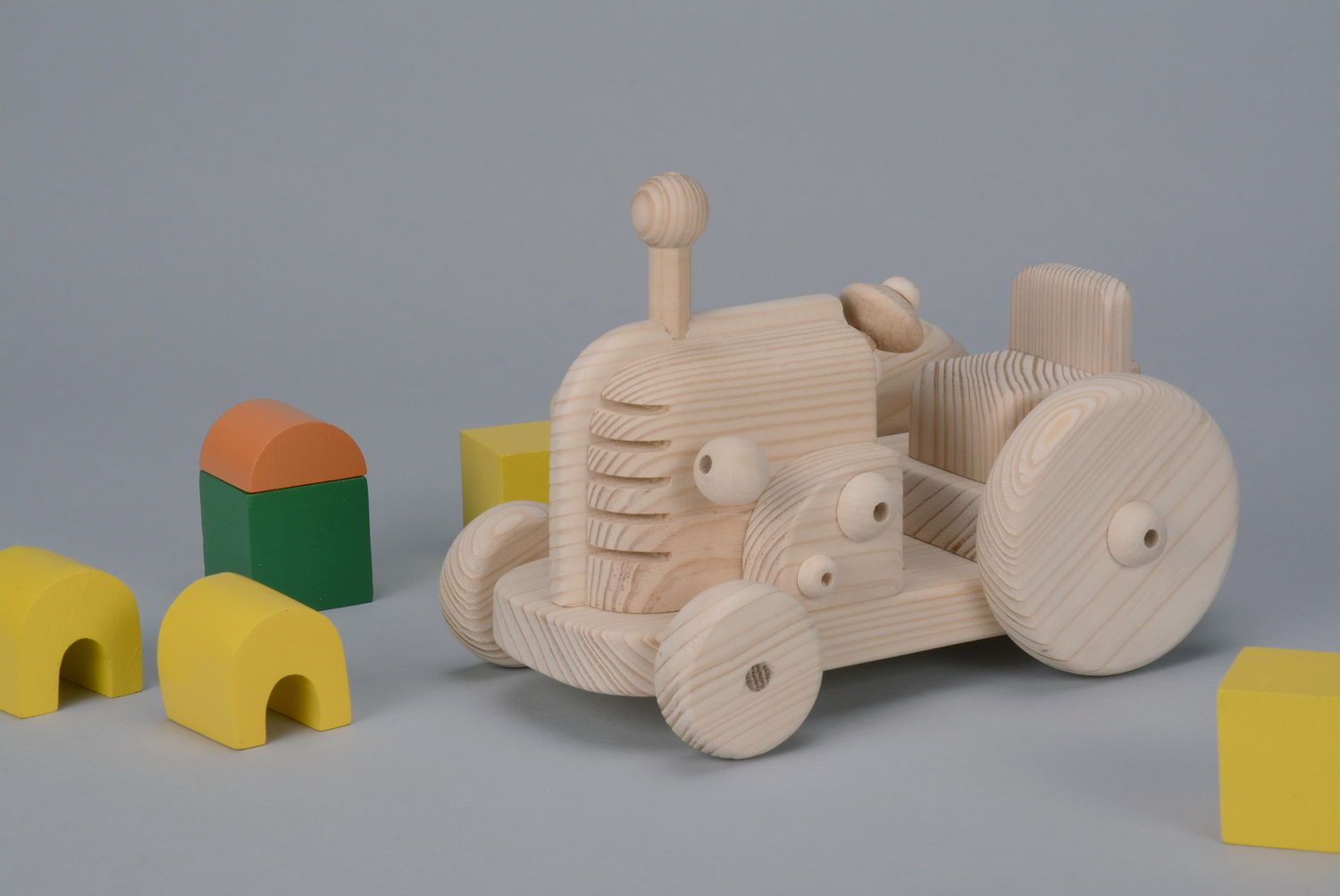 Trattore giocattolo fatto a mano giocattolo di legno giocattolo da bambino foto 5