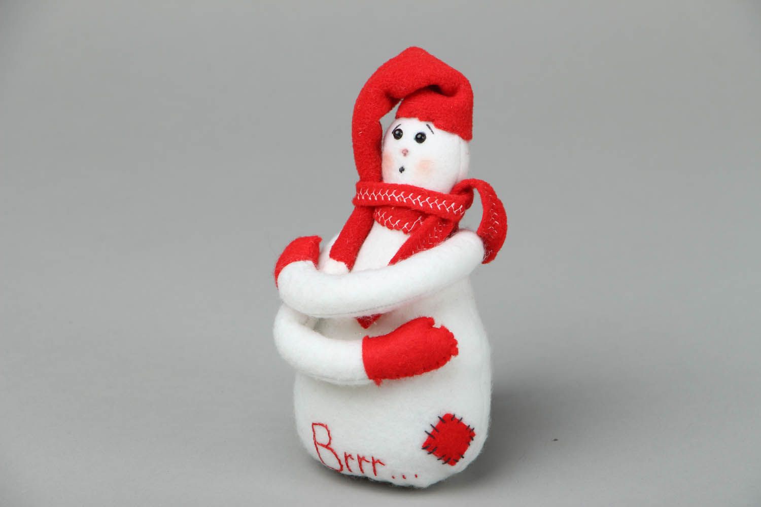 Boneco de neve de feltro em vermelho foto 1