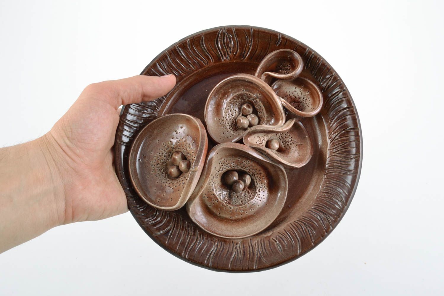 Unusual small handmade decorative clay wall plate of brown color interior design photo 2