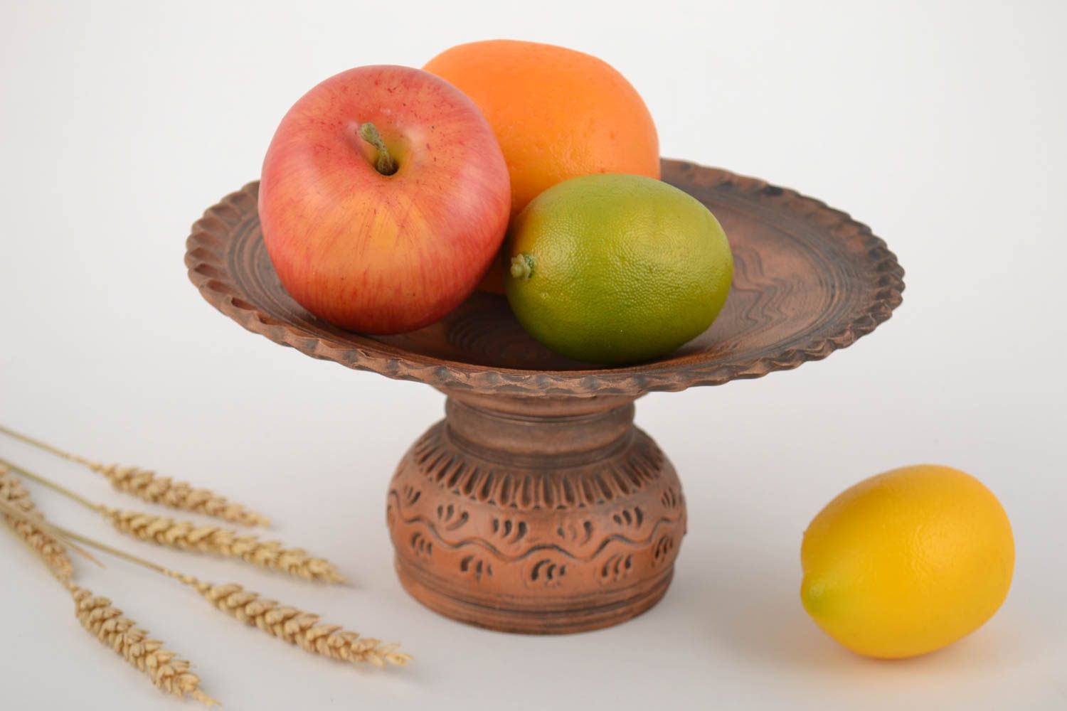 Beautiful handmade designer clay fruit bowl with carved pattern photo 1