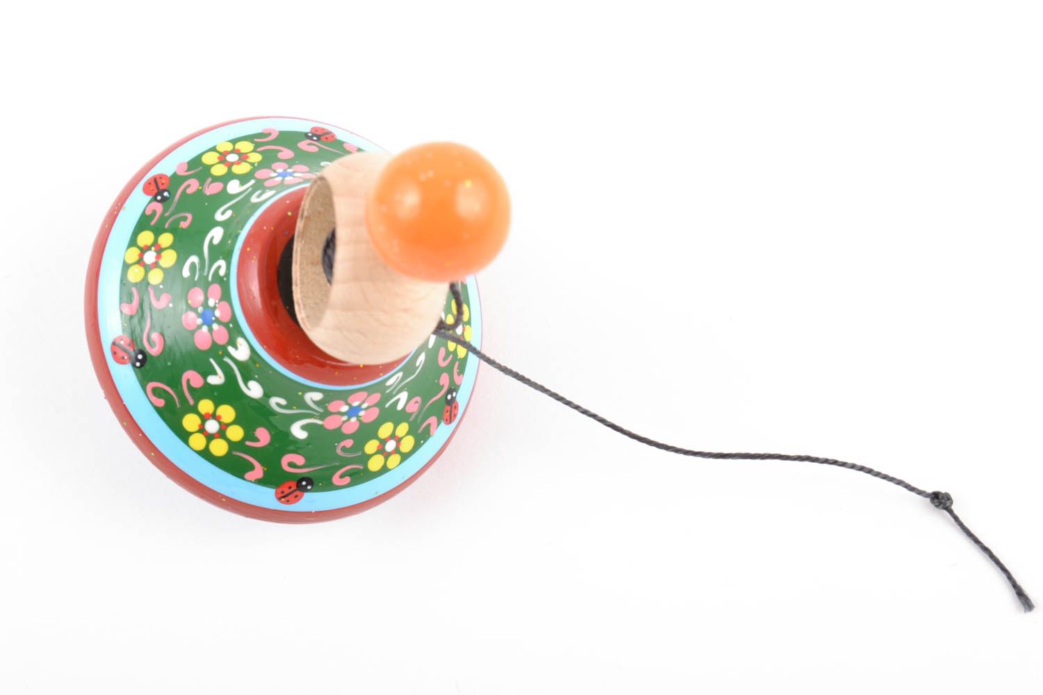 Деревянная игрушка юла с кольцом ручной работы с росписью эко красками для детей фото 5