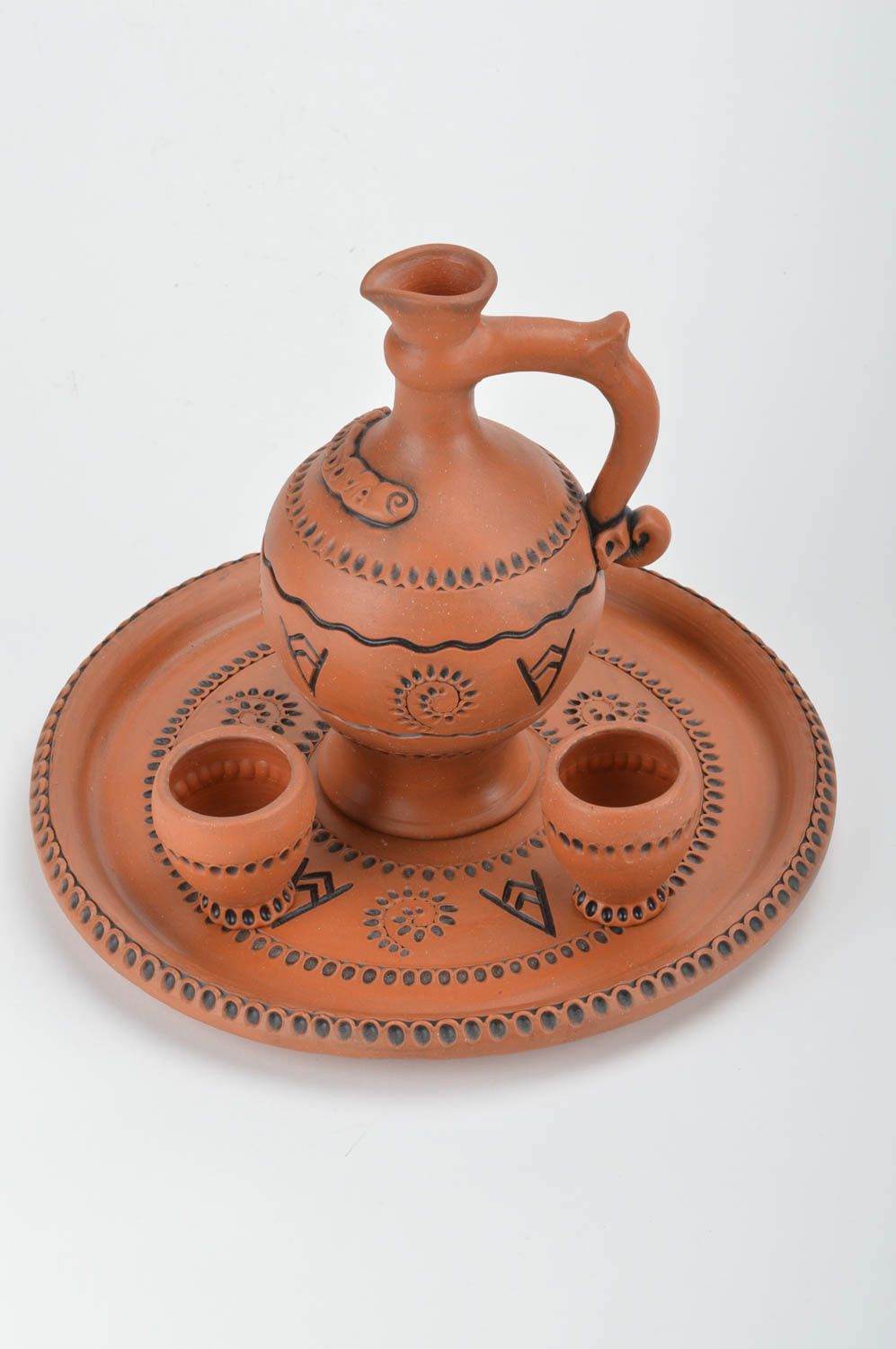Conjunto de vajilla cerámica artesanal bandeja dos copas de 50 ml y jarro  foto 2