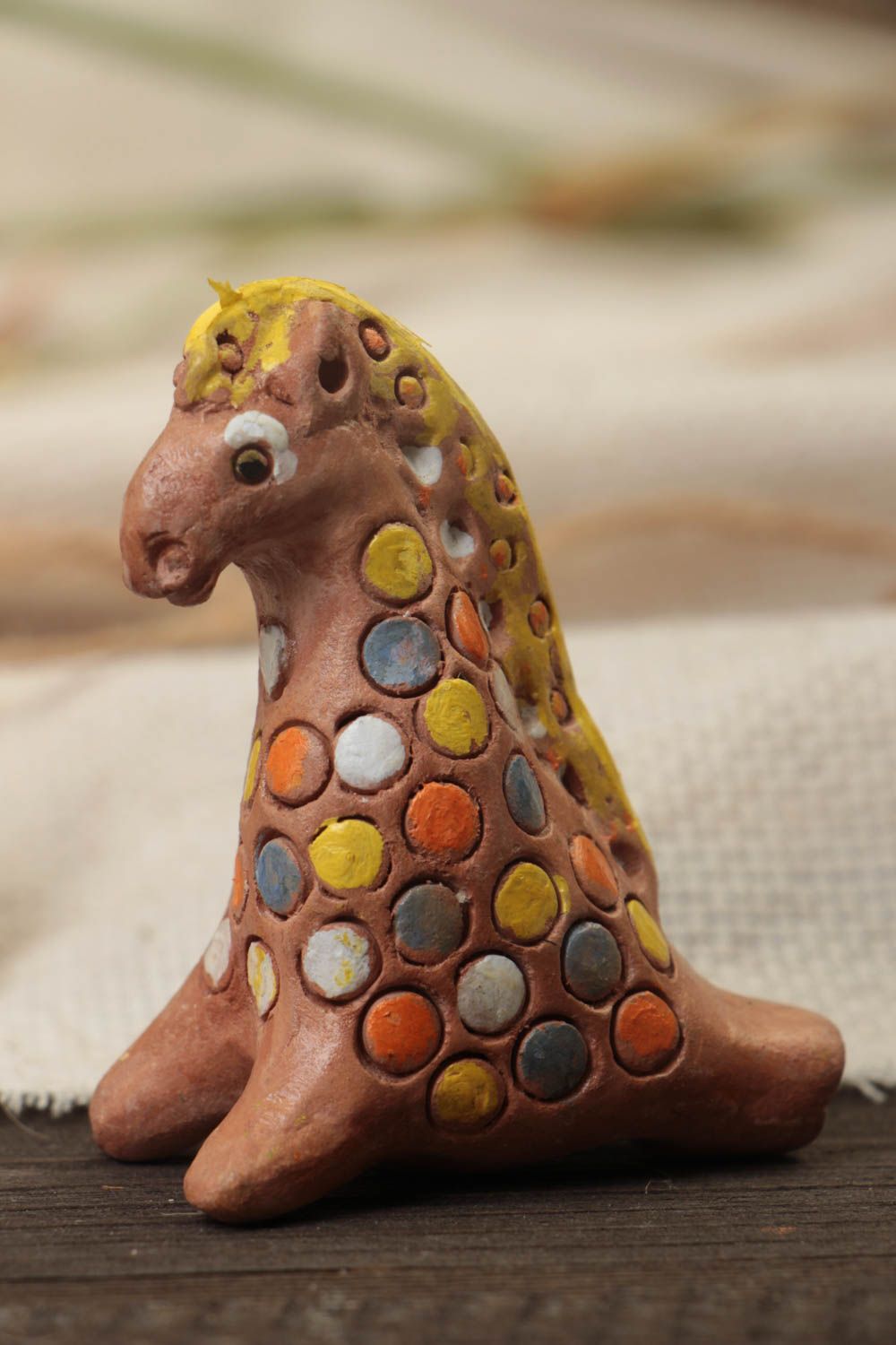 Folk eco friendly toy whistle in the form of horse made of clay with painting photo 1