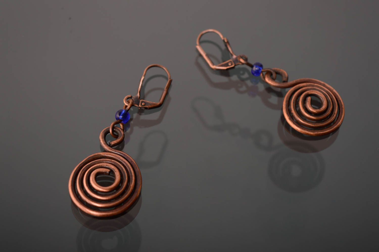 Copper wire wrap earrings in the shape of curls photo 1