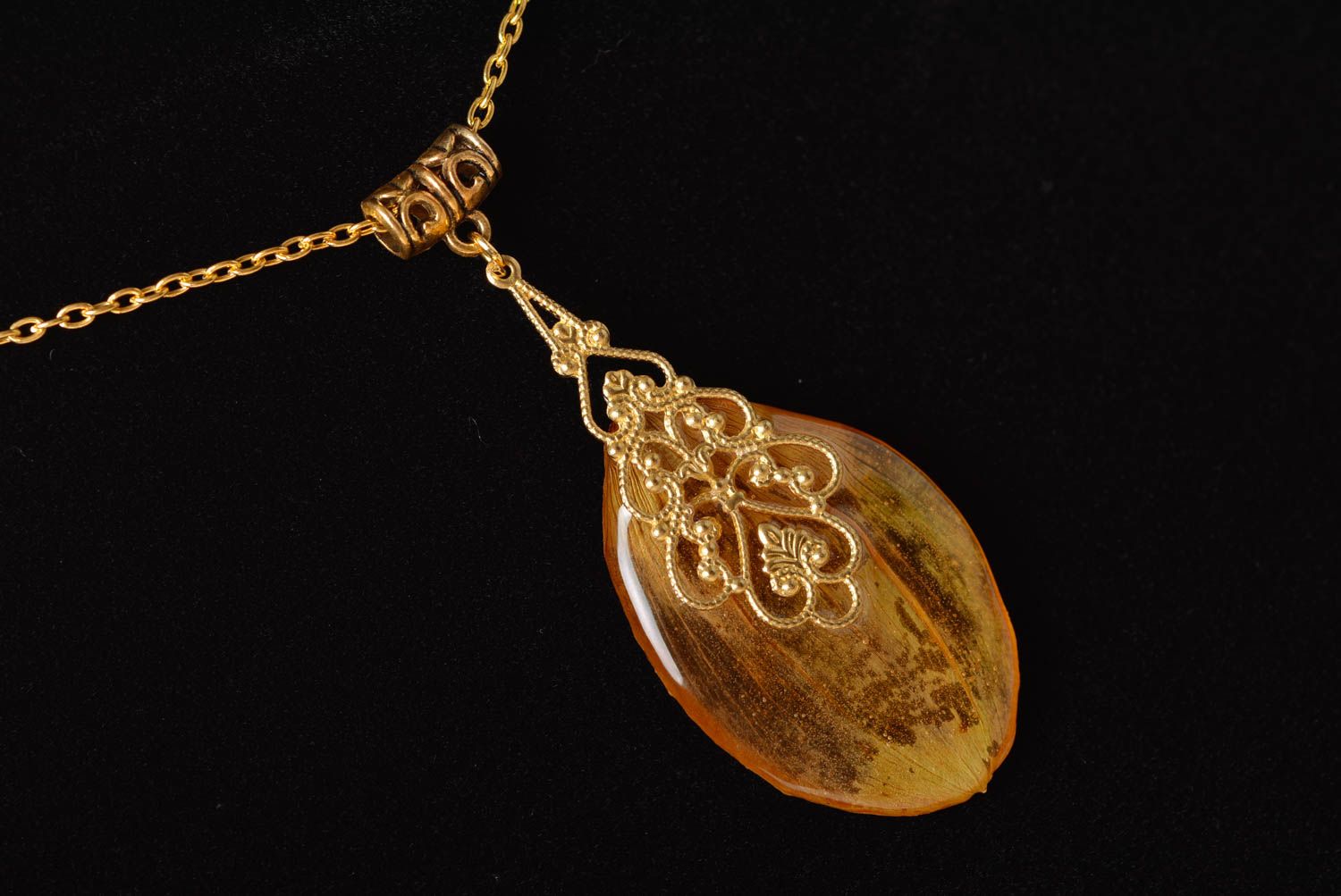 Beautiful handmade yellow pendant with flower petal coated with epoxy photo 3