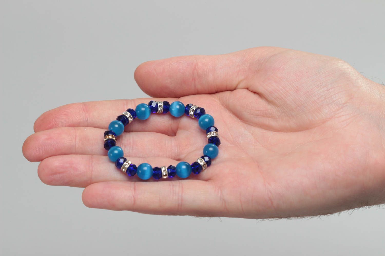 Beautiful bright blue handmade children's bracelet with glass and crystal beads photo 5
