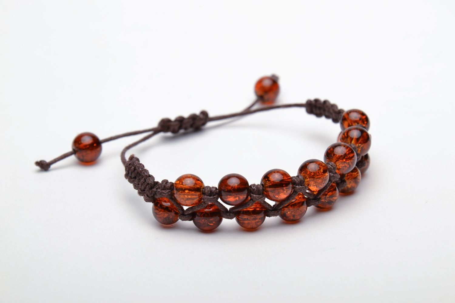 Wrist bracelet made of amber-like beads photo 3