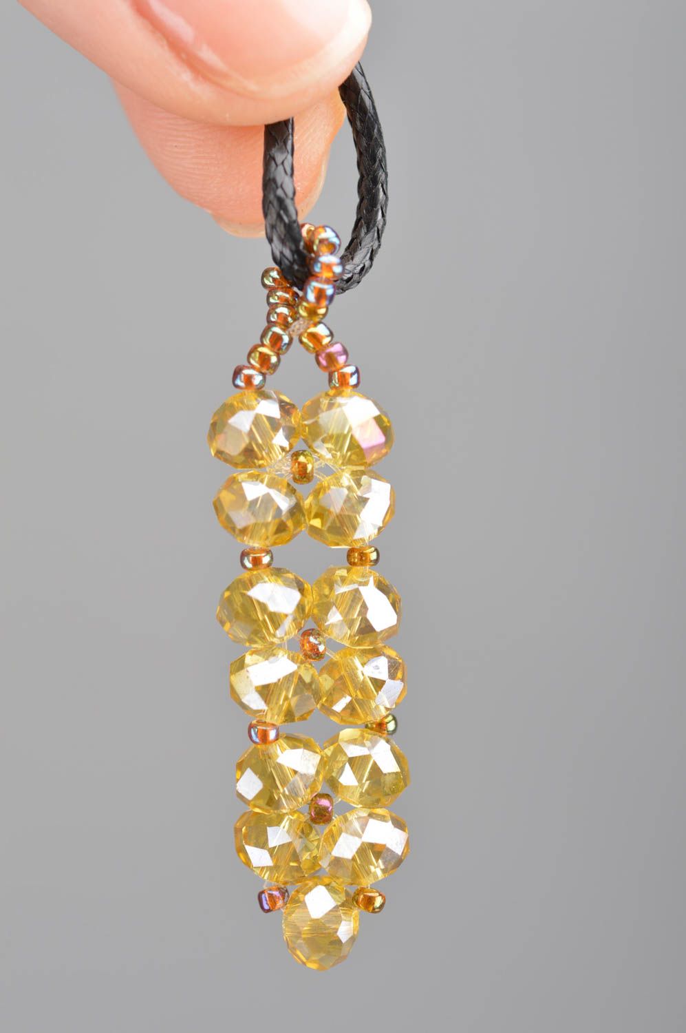 Handmade yellow pendant made of large and seed beads of Czech crystal on lace photo 3