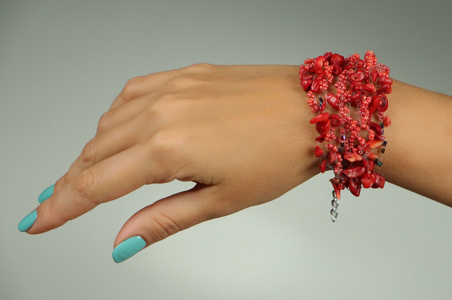 A bracelet with coral and beads photo 4